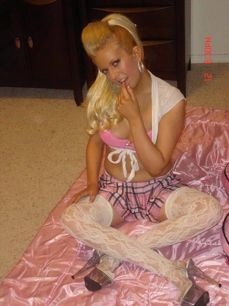 Blonde cheerleader posing and masturbating — 16